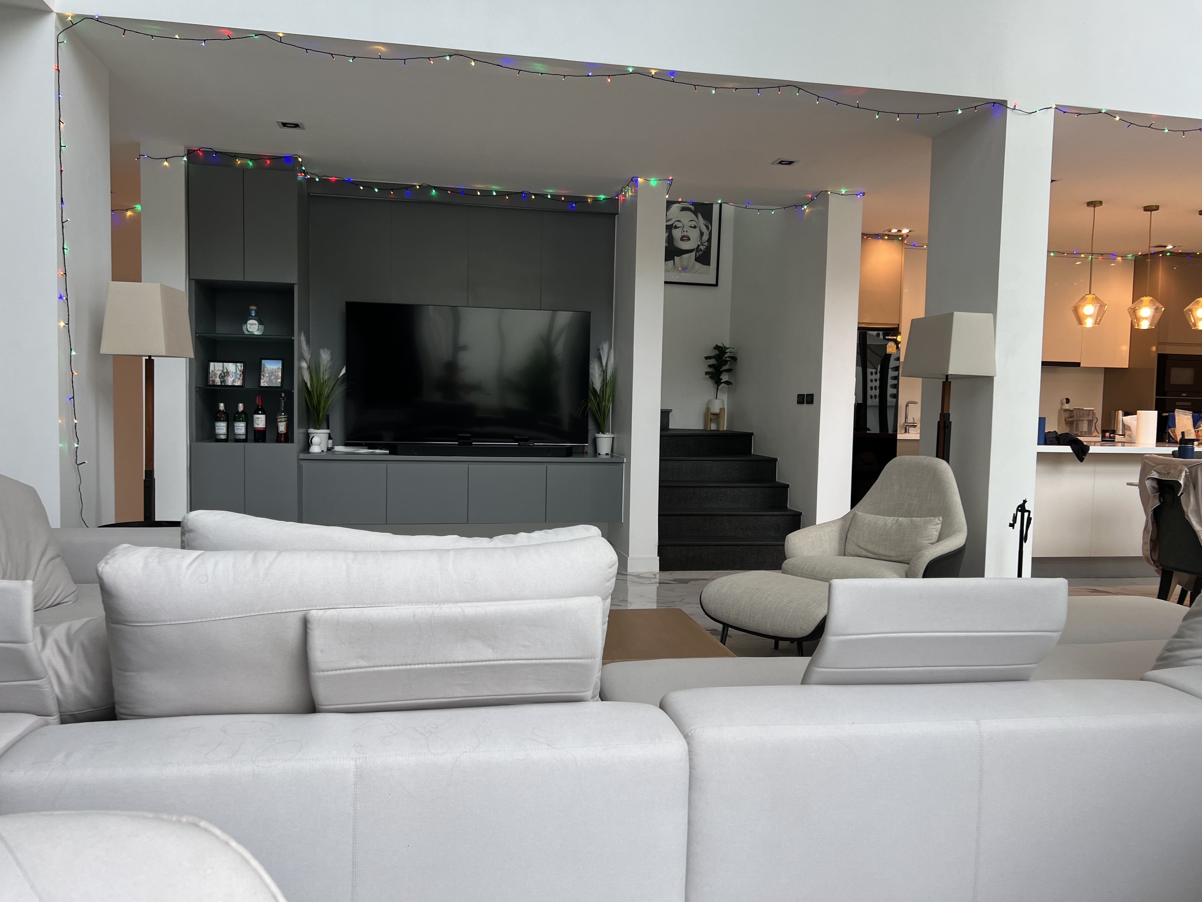Living room with entertainment center and holiday decorations